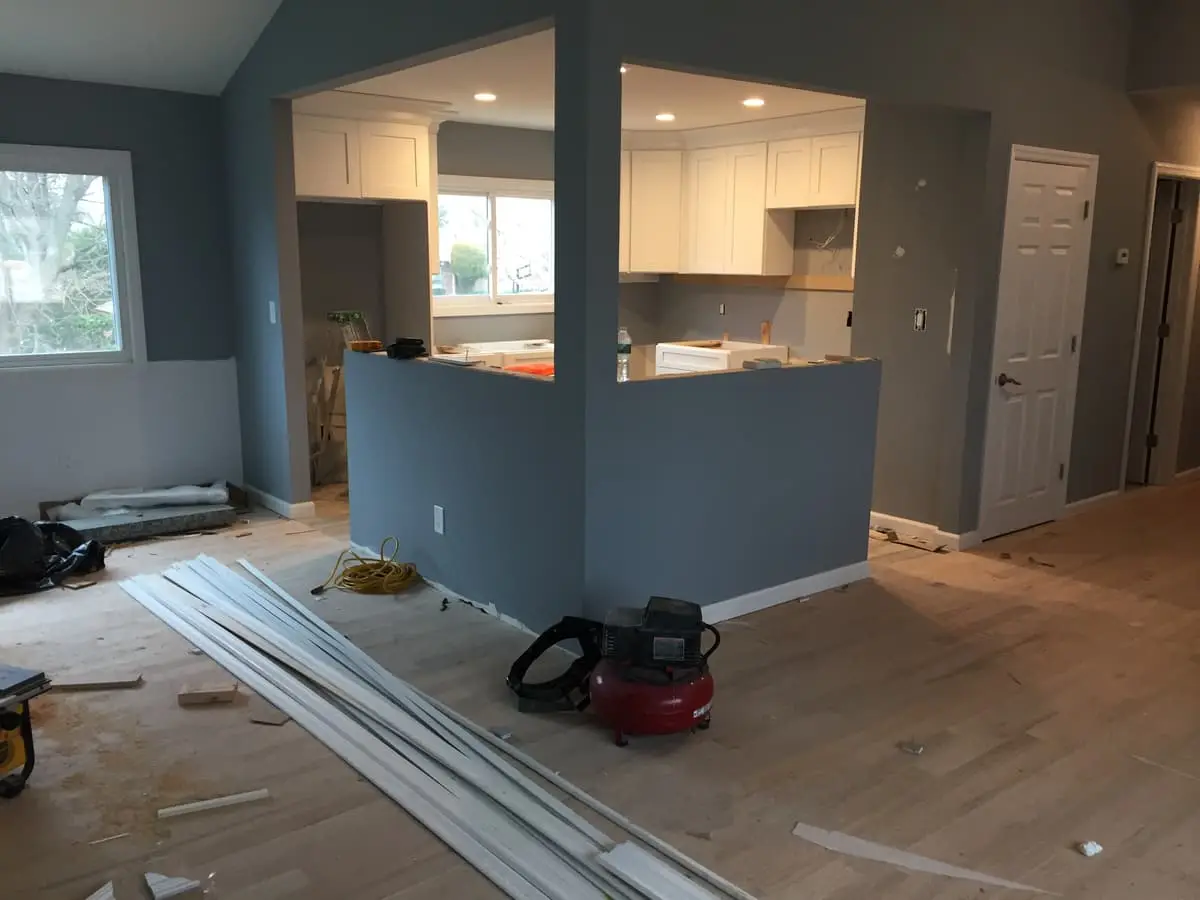 Selling a house with multiple heirs in Amityville: half wall opening into a new kitchen during work
